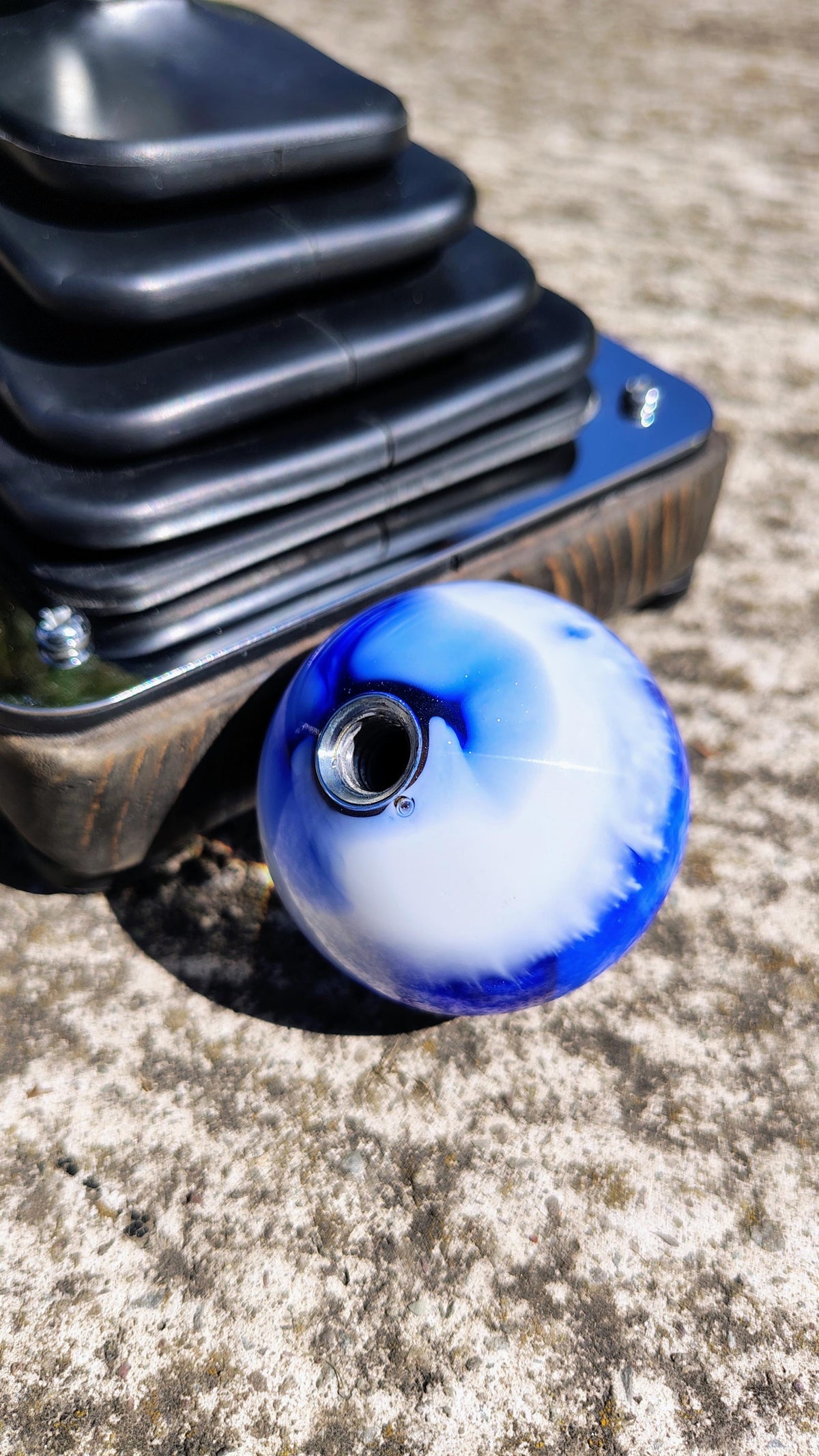Bottom view of The Bad Coupe Resin Shifter Ball showing the 3/8-16 threaded steel insert cast into the base for standard shifter installation