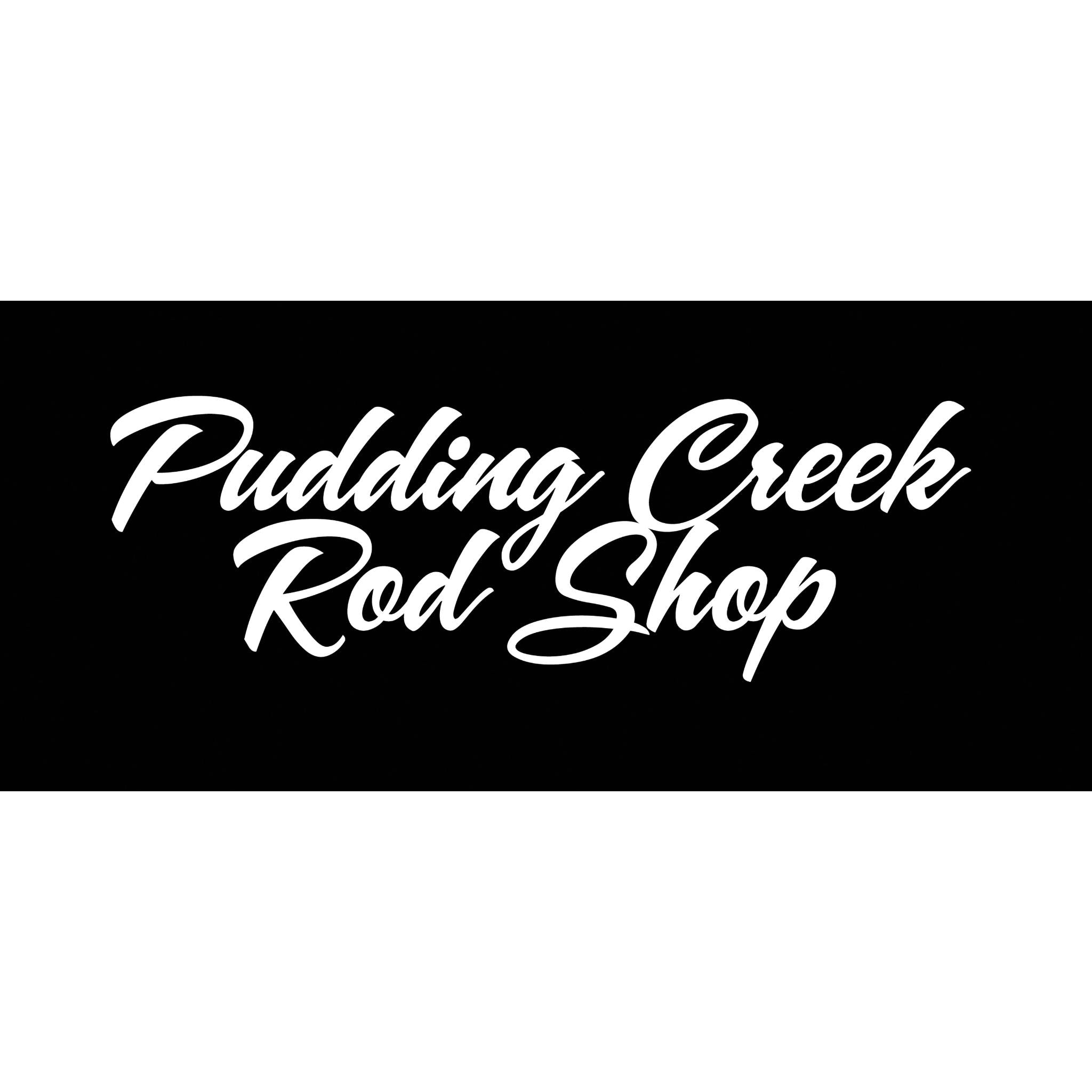 Close-up of white Pudding Creek Rod Shop script logo on black t-shirt