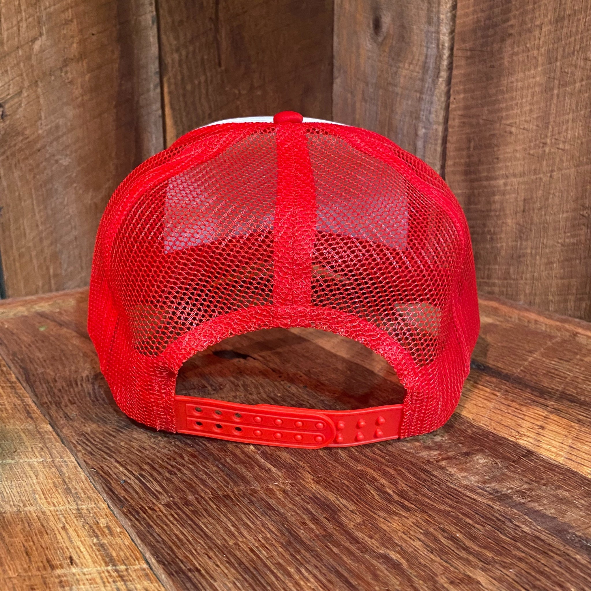 Back view of The Lady Luck Foam Trucker Hat showing the white mesh trucker back and adjustable snapback closure