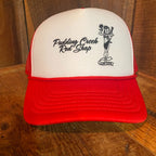 Front view of The Lady Luck Foam Trucker Hat in red and white, featuring the Lady Luck pinup graphic from a 1960s Speed Parts catalog on the structured foam front panel